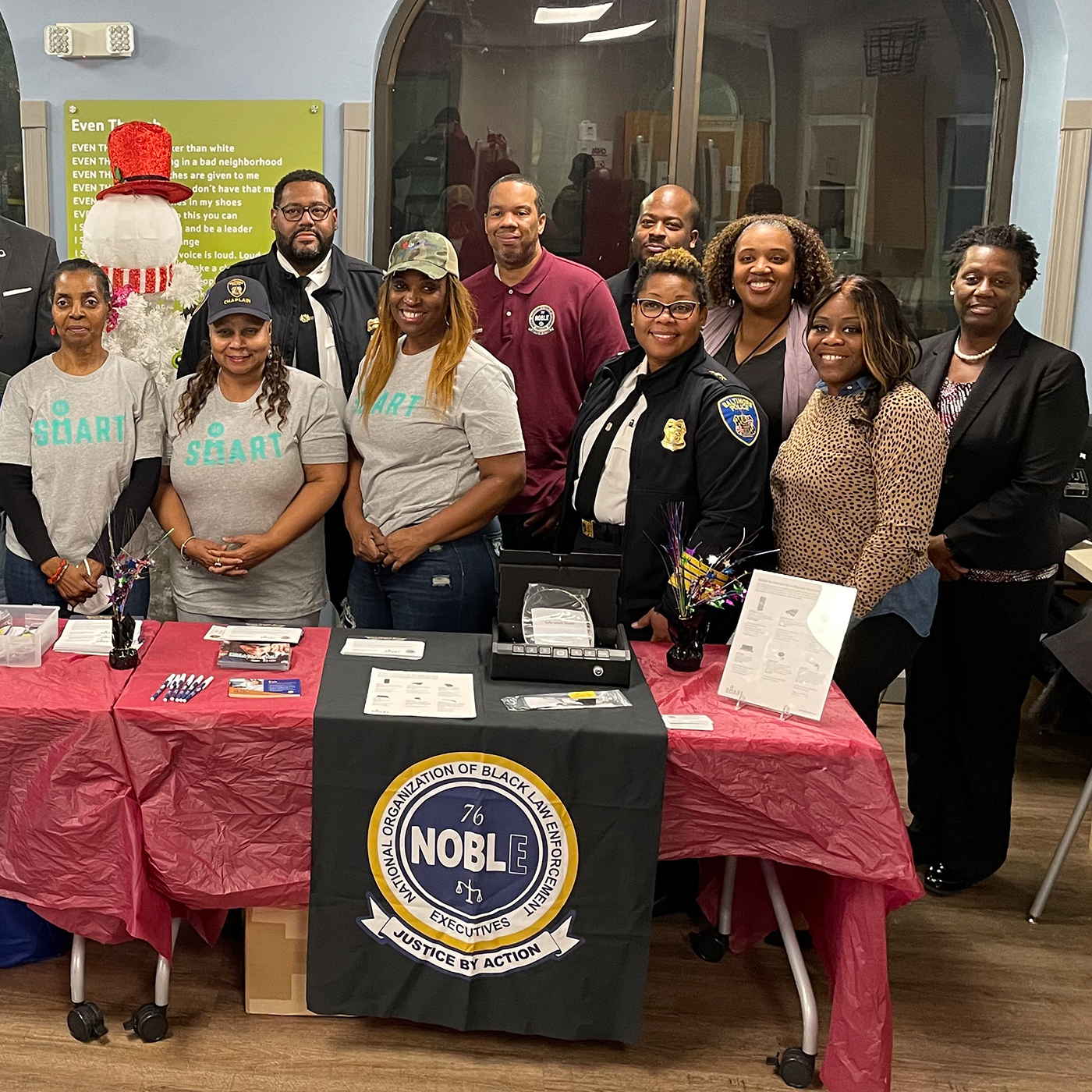 Be SMART members and NOBLE members pose together at an event